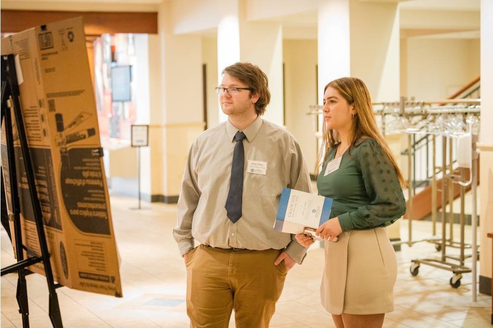 Students looking at research